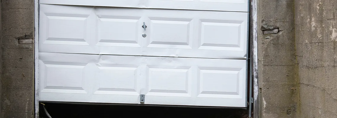 Garage Door Got Hit By A Car Dent Removal in Welland, ON