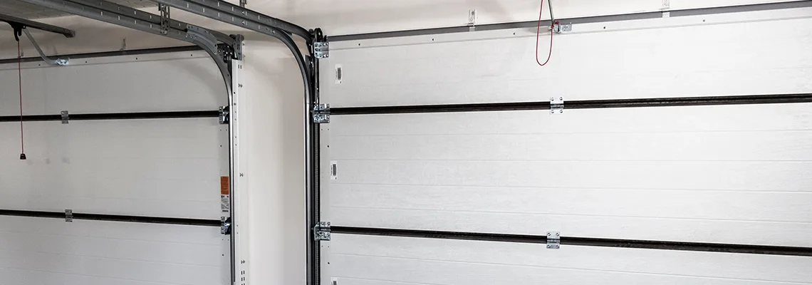 Fix Folding Garage Door Jerking in Welland, Ontario