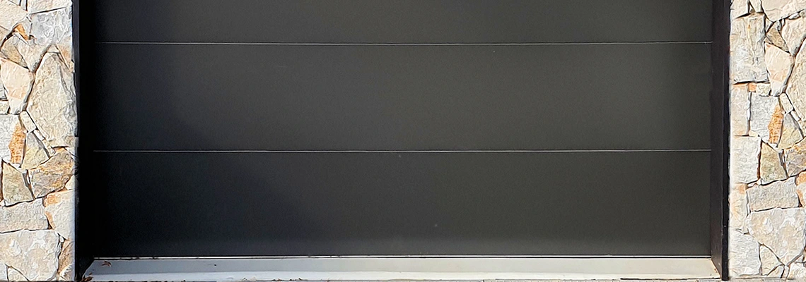 Overhead Black Garage Door Installation in Welland, Ontario