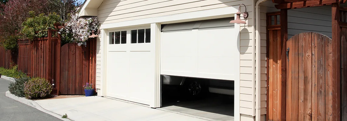 Fix Metal Garage Door Jerking in Welland, Ontario